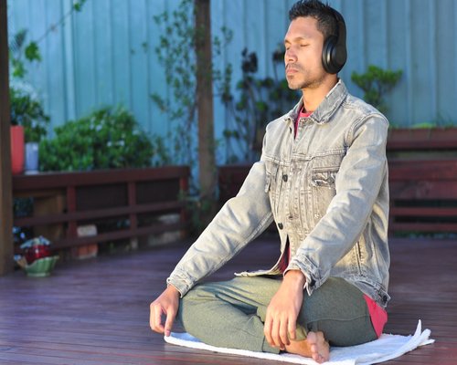 Person practicing meditation and emotional balance